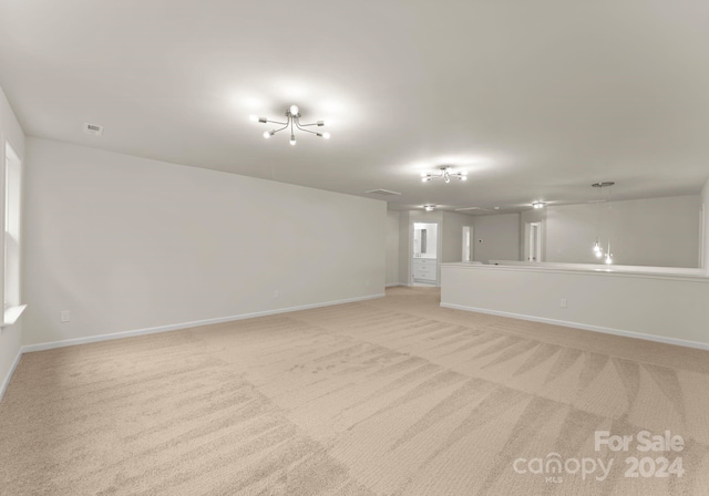 6034 Jepson Ct, Charlotte, NC 28214 - spare room with visible vents, light colored carpet, and baseboards