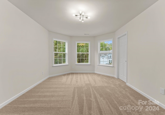 6034 Jepson Ct, Charlotte, NC 28214 - carpeted spare room featuring baseboards