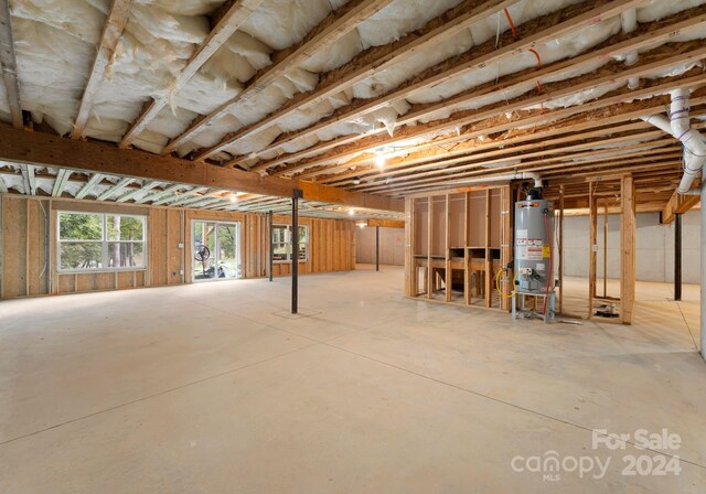 basement featuring gas water heater