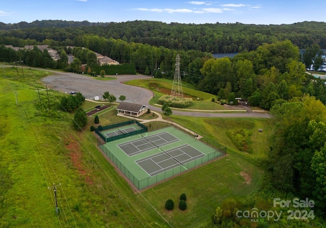 6034 Jepson Ct, Charlotte, NC 28214 - drone / aerial view with a wooded view
