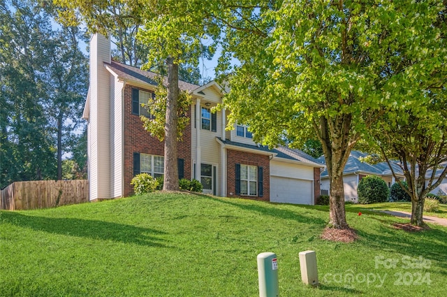 view of front facade with a front lawn