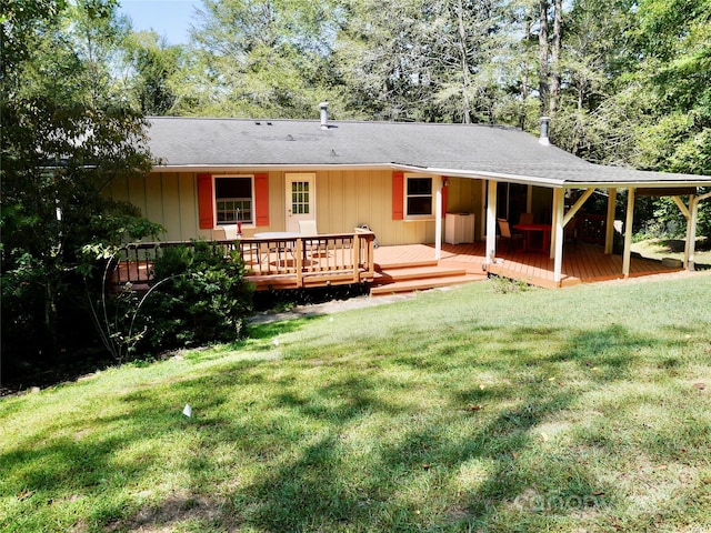 19 Brookcliff Dr, Asheville, NC 28804 - rear view of house with a wooden deck and a lawn