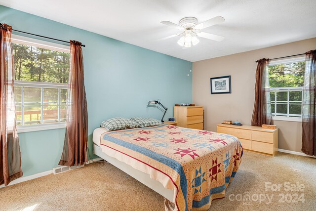 bedroom featuring carpet flooring and ceiling fan