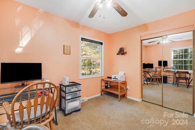 office area featuring ceiling fan and carpet