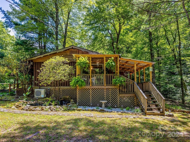 view of front of home with a wooden deck