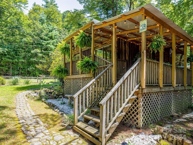wooden deck featuring stairs