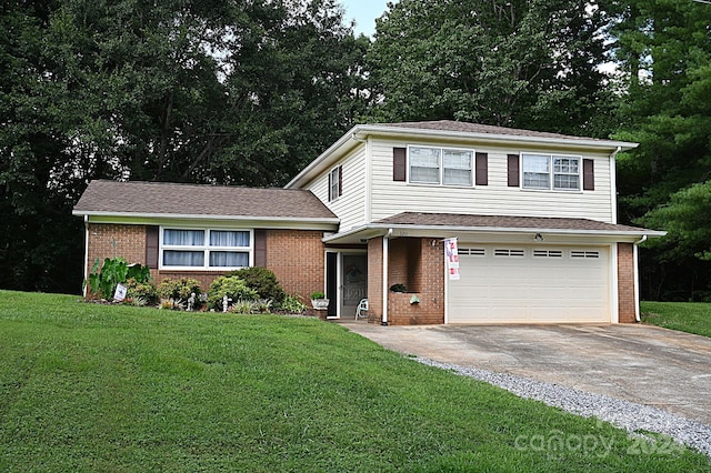 front facade featuring a garage and a front yard