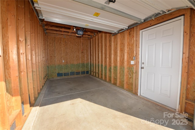 garage featuring a garage door opener