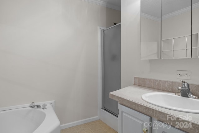 bathroom featuring ornamental molding, independent shower and bath, tile patterned floors, a textured ceiling, and vanity