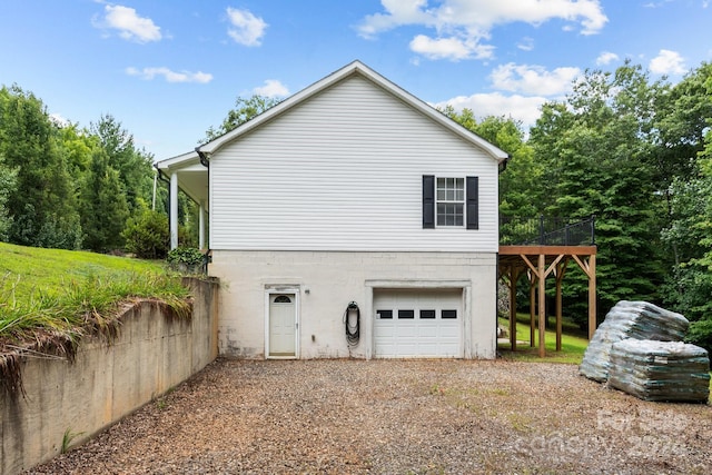 view of home's exterior with a garage