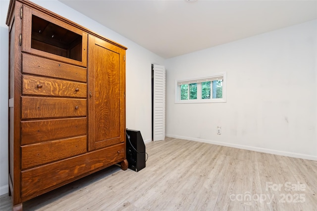 unfurnished bedroom featuring light hardwood / wood-style flooring