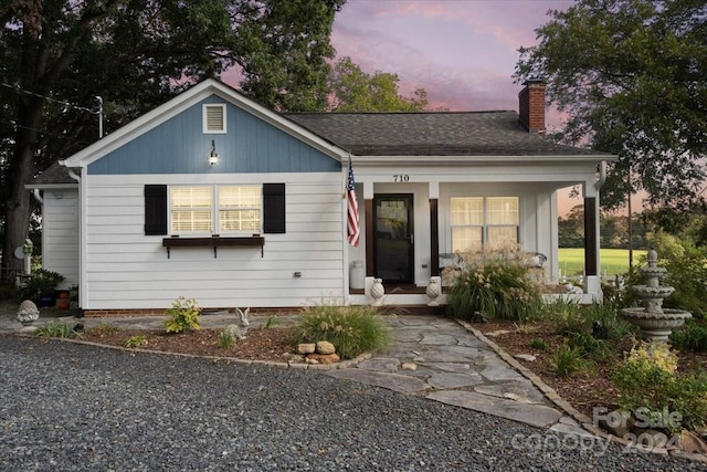 view of front of home with covered porch