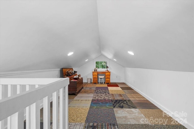 bedroom featuring carpet floors and vaulted ceiling