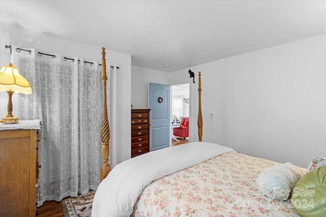 bedroom featuring wood-type flooring