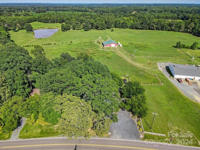 aerial view featuring a water view and a rural view