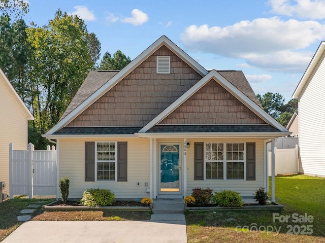 view of front of property with a front lawn