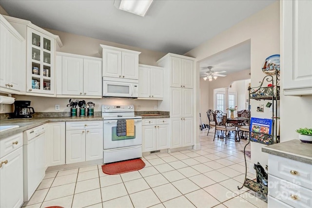 kitchen featuring white cabinets, white appliances, ceiling fan, and light tile patterned flooring