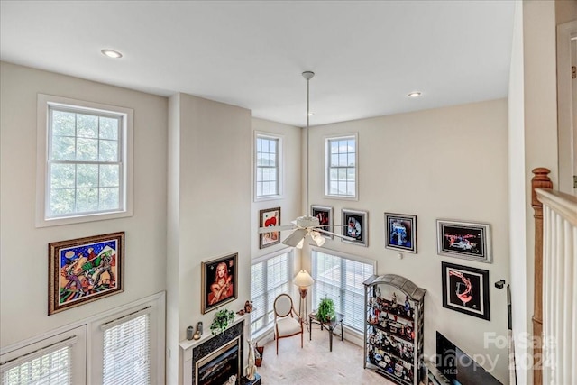 interior space with recessed lighting and a fireplace