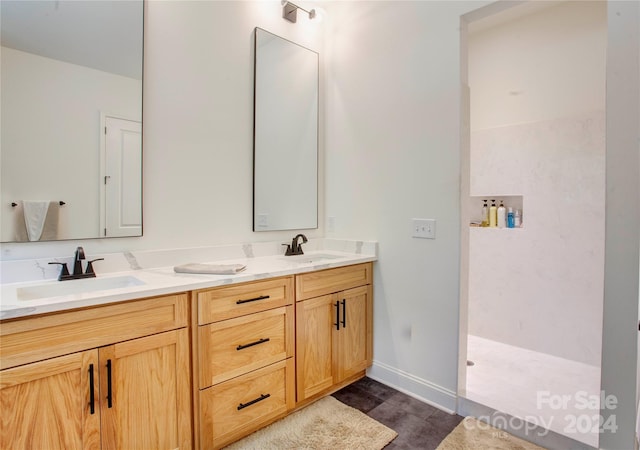 bathroom with vanity and tile patterned floors