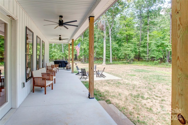 view of patio / terrace with an outdoor living space and ceiling fan