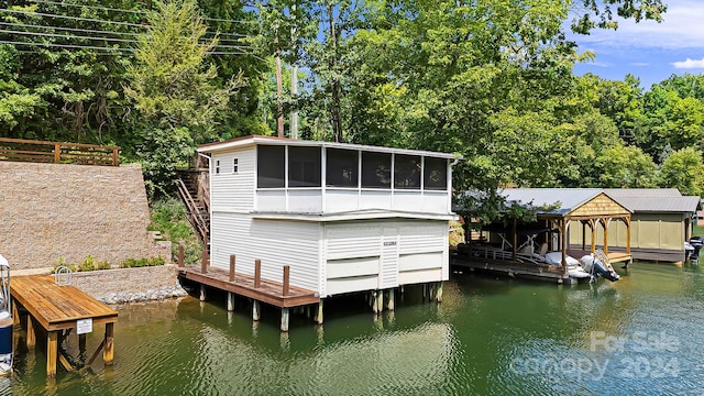 view of dock with a water view