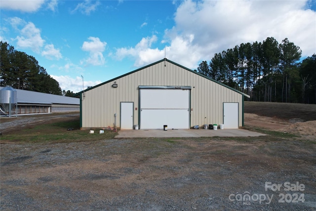 view of outdoor structure with a garage