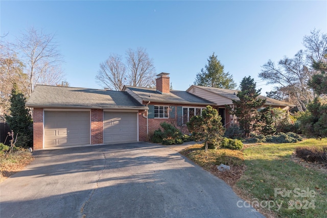 ranch-style house with a garage