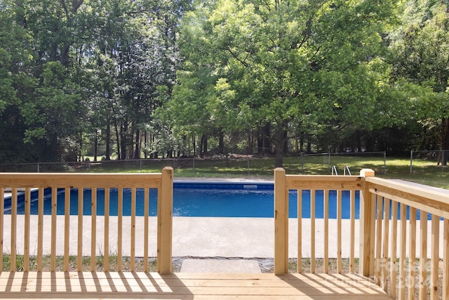 pool featuring a fenced backyard