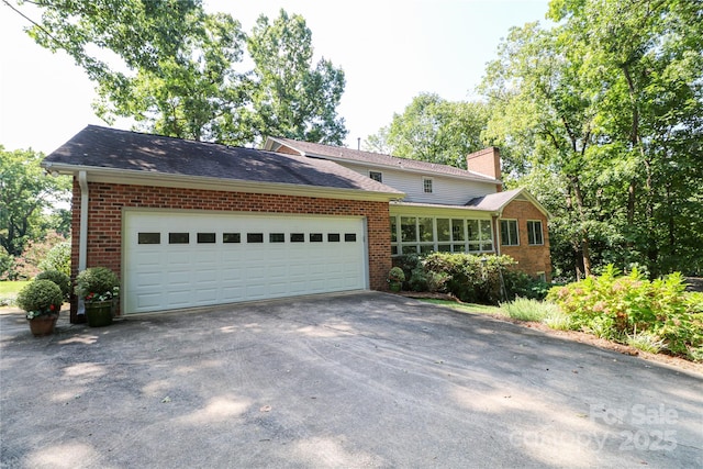 single story home featuring a garage