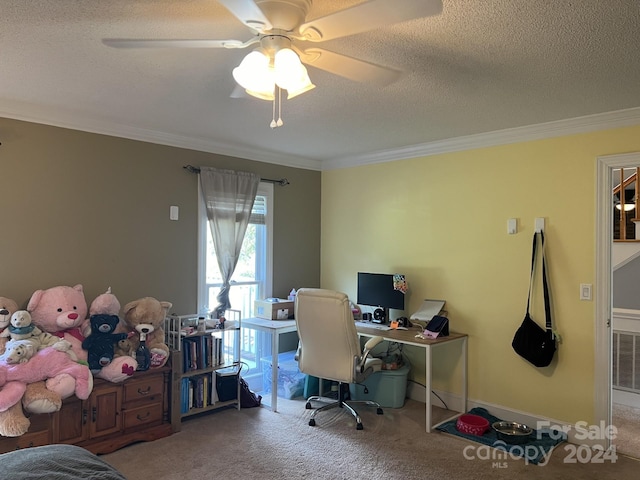 office featuring ceiling fan, carpet floors, ornamental molding, and a textured ceiling