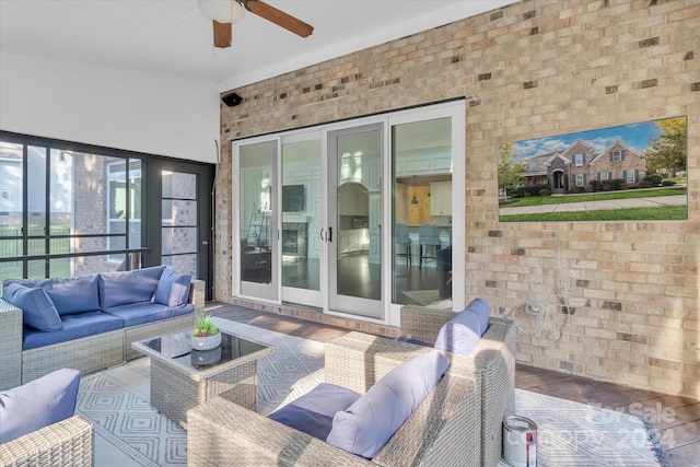 view of patio / terrace with ceiling fan and an outdoor hangout area