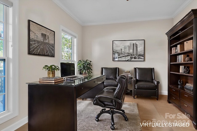 office area featuring light tile patterned floors and ornamental molding