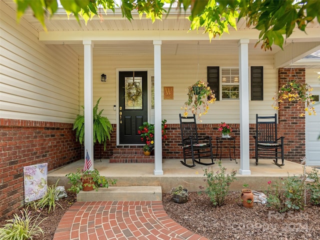 entrance to property with a porch