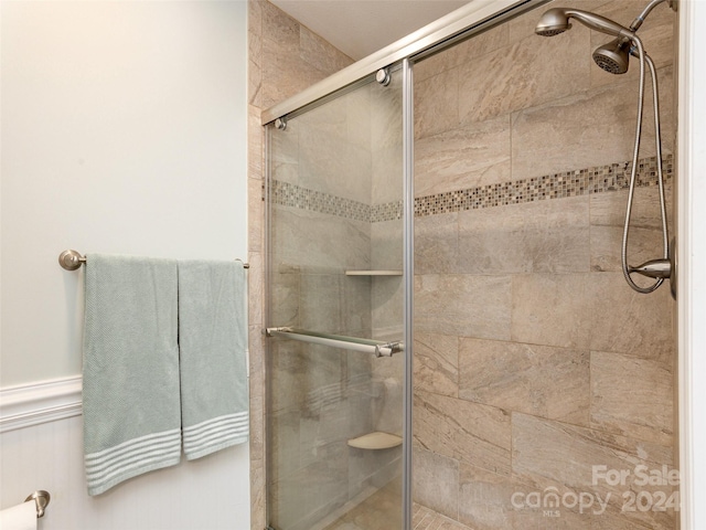 bathroom featuring an enclosed shower