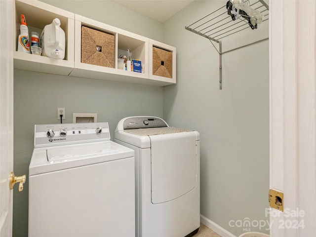 laundry area featuring separate washer and dryer