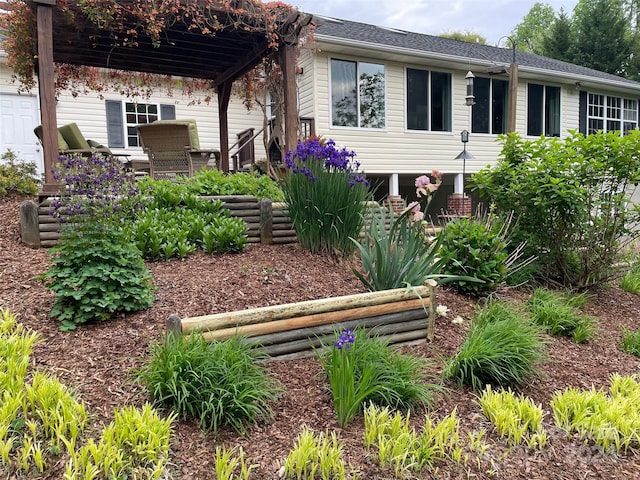 view of front of property with a pergola