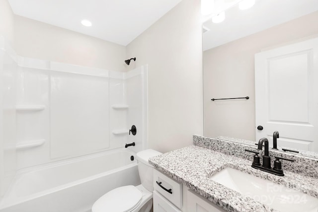 full bathroom featuring toilet, shower / washtub combination, and vanity