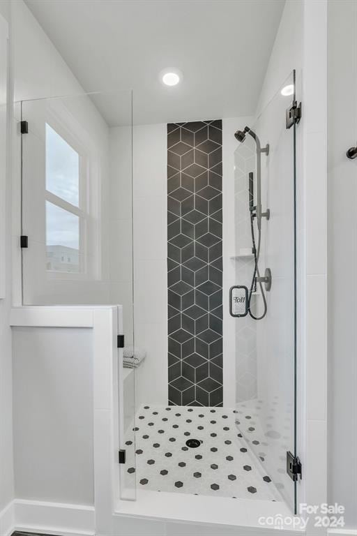 bathroom featuring an enclosed shower