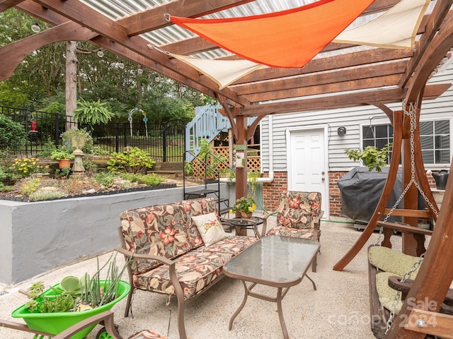 view of patio featuring outdoor lounge area, a pergola, and area for grilling