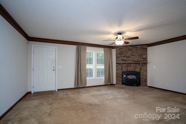 unfurnished living room featuring carpet, crown molding, and a wood stove