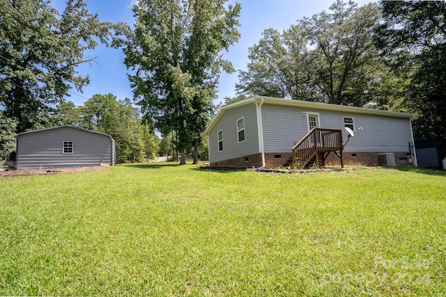 view of yard featuring central AC