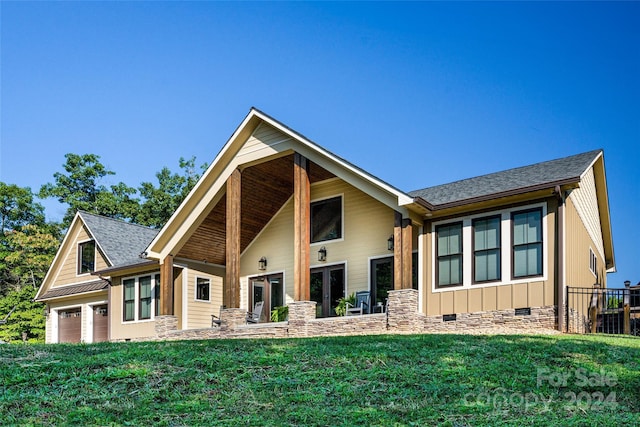 6521 Lake James Rd, Marion, NC 28752 - view of front of house with crawl space, a front yard, board and batten siding, and roof with shingles