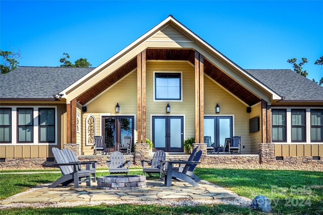 6521 Lake James Rd, Marion, NC 28752 - back of house with french doors, an outdoor fire pit, roof with shingles, and a patio