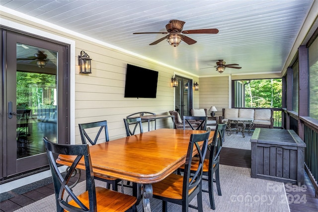 exterior space with ceiling fan