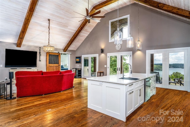 kitchen with high vaulted ceiling, hardwood / wood-style floors, white cabinetry, ceiling fan, and french doors