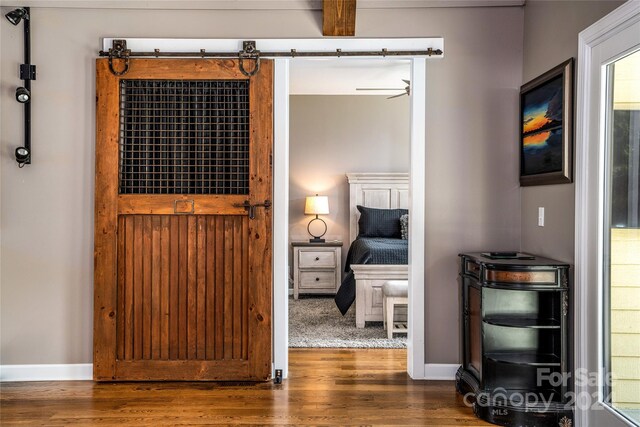 interior space with hardwood / wood-style flooring