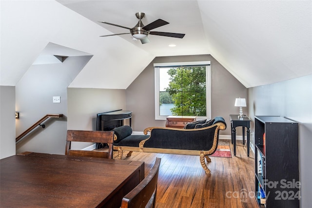 6521 Lake James Rd, Marion, NC 28752 - dining room featuring wood-type flooring, ceiling fan, vaulted ceiling, and baseboards