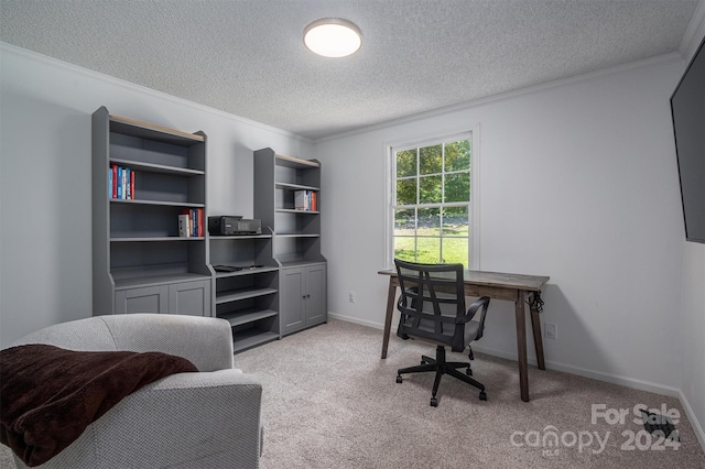 home office featuring a textured ceiling, ornamental molding, and light carpet