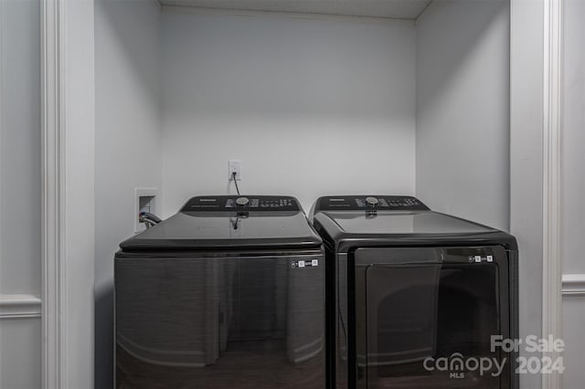 laundry room featuring washing machine and dryer