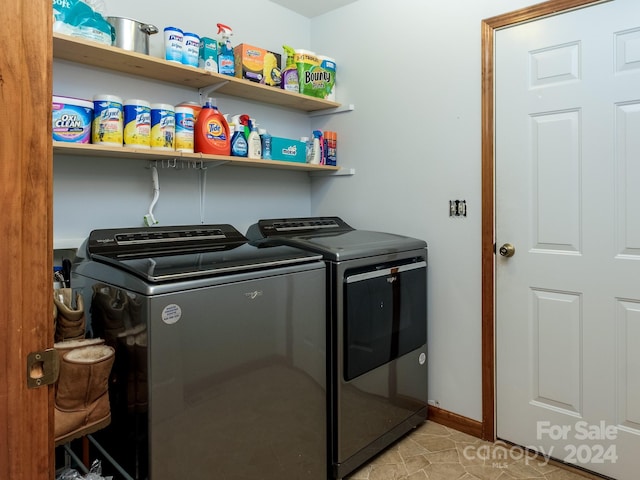 2921 Connestee Trl, Brevard, NC 28712 - laundry area featuring independent washer and dryer and baseboards